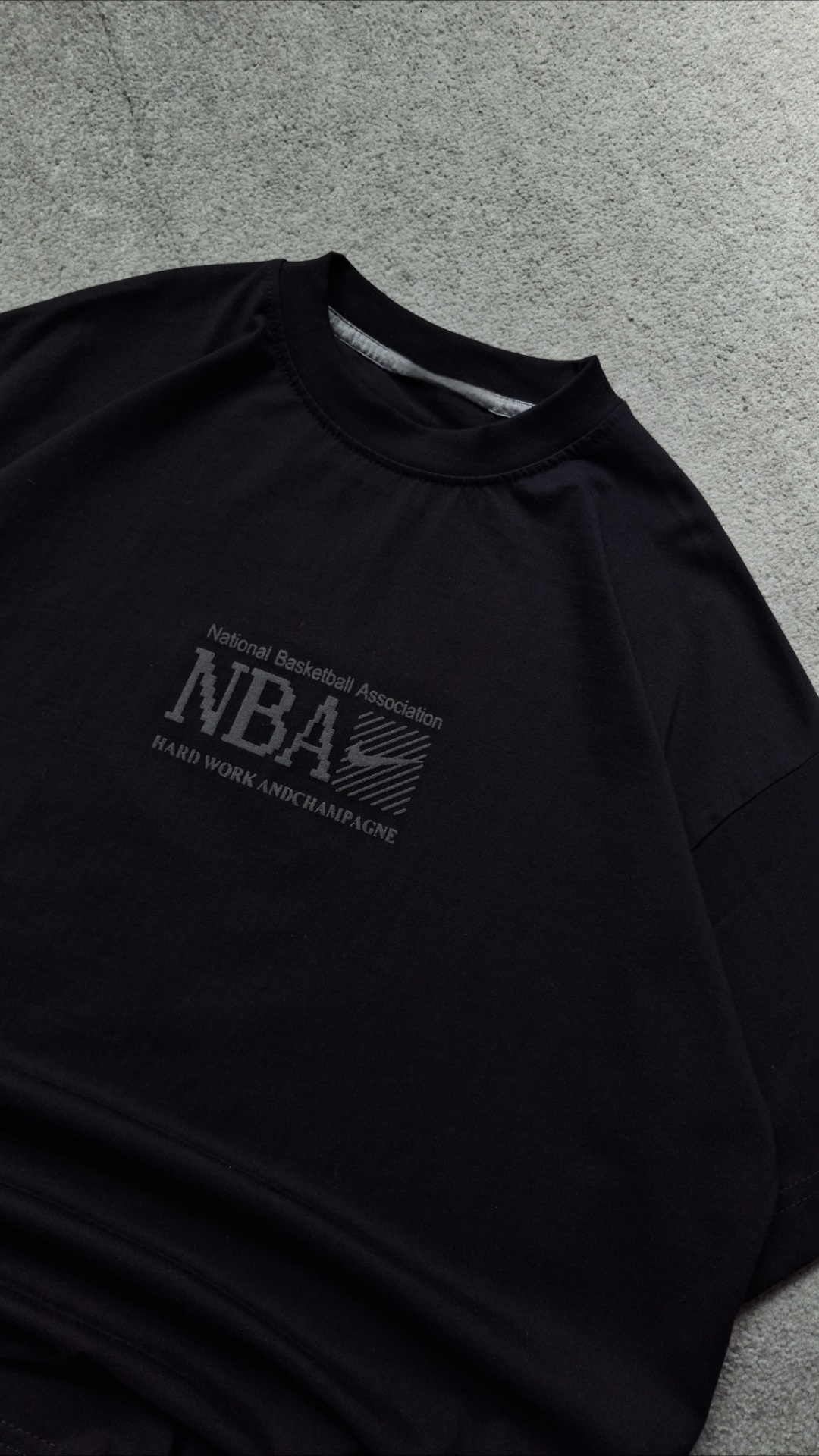 تیشرت مشکی پارچه پنبه قواره باکسی مدل NBA کد TSH0016